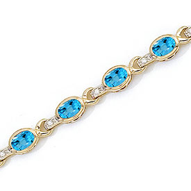 10K Yellow Gold Oval Blue Topaz and Diamond Bracelet