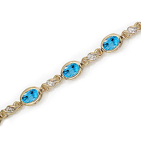 14K Yellow Gold Oval Blue Topaz and Diamond Bracelet