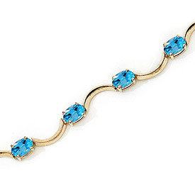 14K Yellow Gold Oval Blue Topaz Bracelet