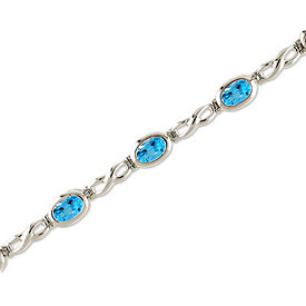 14K White Gold Oval Blue Topaz Bracelet