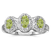 14k White Gold Oval Peridot And Diamond Three Stone Ring