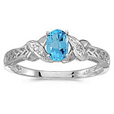 14k White Gold Oval Blue Topaz And Diamond Ring