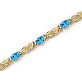 14K Yellow Gold Oval Blue Topaz Bracelet