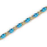 14K Yellow Gold Oval Blue Topaz Bracelet