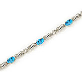 14K White Gold Oval Blue Topaz and Diamond Bracelet