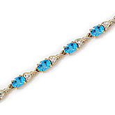 14K Yellow Gold Oval Blue Topaz and Diamond Bracelet