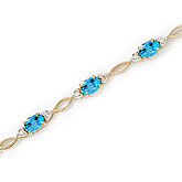 14K Yellow Gold Oval Blue Topaz and Diamond Bracelet