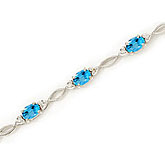 14K White Gold Oval Blue Topaz and Diamond Bracelet