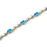 14K White Gold Oval Blue Topaz and Diamond Bracelet