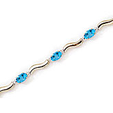 14K Yellow Gold Oval Blue Topaz and Diamond Bracelet
